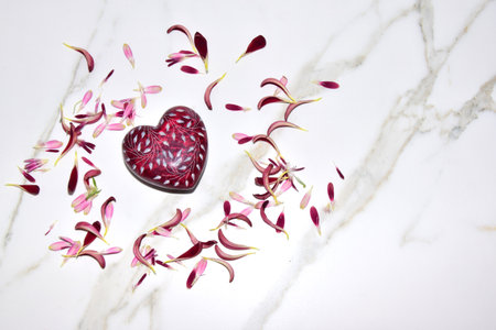 Decorative heart on a stone backgroundの写真素材