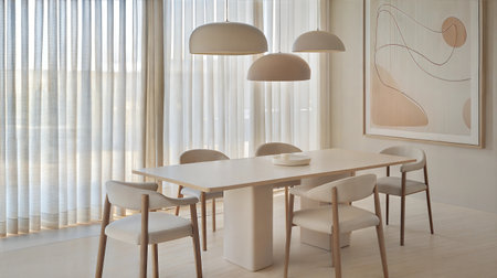Interior of a modern dining room with a wooden table and chairsの素材