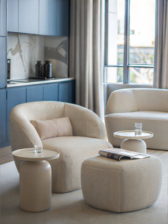 Modern living room interior with armchairs, coffee table and a bookの素材