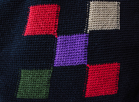 Knitted fabric background close upの写真素材