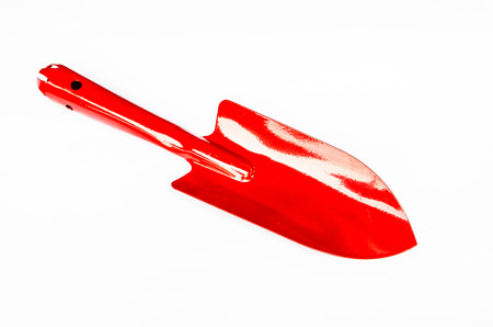 Garden trowel, red color on white backgroundの写真素材