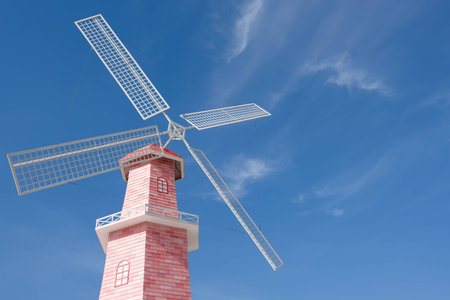 Pink and White wind mill with blue sky background