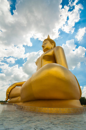 Golden Big Buddha Statue in thailand under the blue skyの写真素材