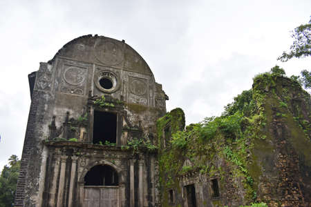 Old ruins of an abandoned church in the jungle of Bali, Indonesiaの写真素材