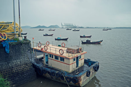 Traditional wooden fishing boats in a port, mumbai, maharashtraの写真素材