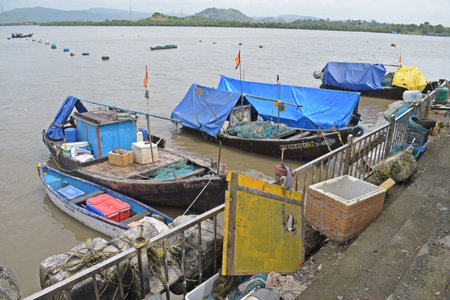 fishing boats at the pier in the town of Mae Salong north of the city Chiang Rai in North Thailand.の写真素材