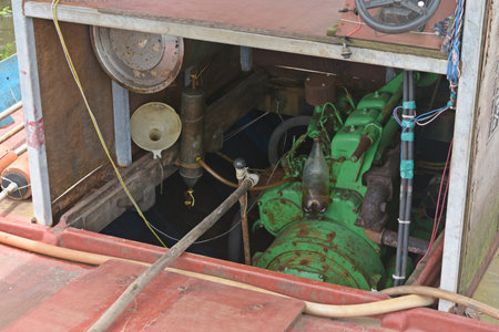 Old and rusty motor boat in the port of Penang, Malaysiaの写真素材
