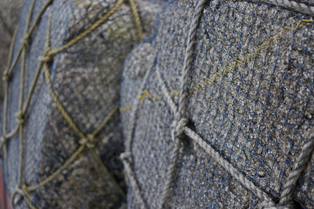Fishing nets and ropes on a fishing boat, close-upの写真素材