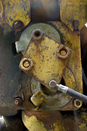 Detail of an old heavy industrial machine, closeup of photo