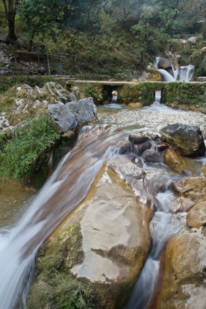 waterfall in the forest, closeup of photo with soft focusの写真素材
