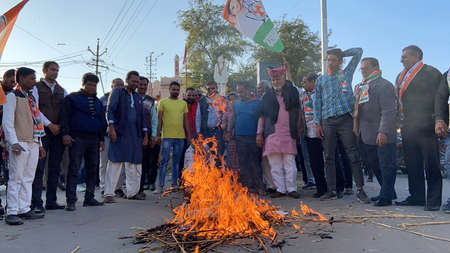 Beawar, Rajasthan, India, Jan. 29, 2021: Congress workers raise slogans and burnt effigy of Indian Prime Minister Narendra Modi during a protest against Modi's central government's anti-farmers measures and riots, in Beawar. Farmers have been protesting aのeditorial素材