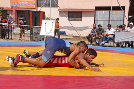 Beawar, Rajasthan, India, February 14, 2021: Wrestlers in their match during state level Greco-Roman wrestling championship in Beawar. Photo: Sumit Saraswatのeditorial素材