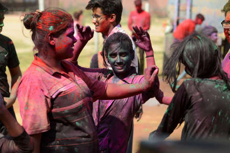 Beawar, Rajasthan, India, March 2, 2018: Indian girls dance as they celebrate Holi, the spring festival of colours, in Beawar. Photo: Sumit Saraswatのeditorial素材