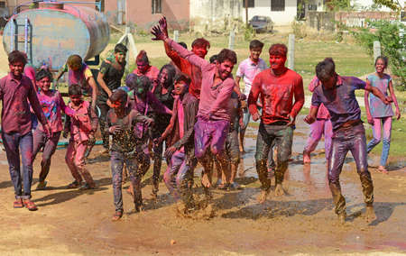 Beawar, Rajasthan, India, March 2, 2018: Revellers dance as they celebrate Holi, the spring festival of colours, in Beawar. Photo: Sumit Saraswatのeditorial素材