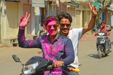 Beawar, Rajasthan, India, March 2, 2018: People celebrate Holi, the spring festival of colours, in Beawar. Photo: Sumit Saraswatのeditorial素材