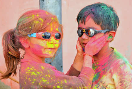 Beawar, Rajasthan, India, March 2, 2018: Children play with colors as they celebrate Holi, the spring festival of colours, in Beawar. Photo: Sumit Saraswatのeditorial素材
