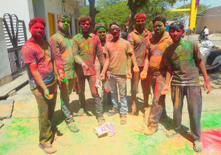 Beawar, Rajasthan, India, March 24, 2016: Youngsters celebrate Holi, the Hindu spring festival of colors, in Beawar. Photo: Sumit Saraswatのeditorial素材