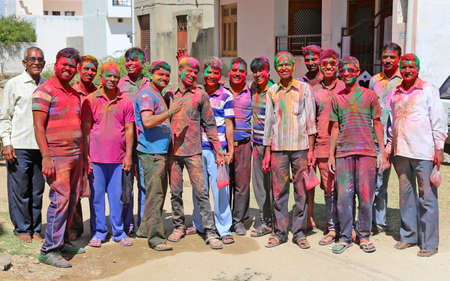 Beawar, Rajasthan, India, March 24, 2016: Indian people smeared in color powder celebrate Holi, the Hindu spring festival of colors, in Beawar. Photo: Sumit Saraswatのeditorial素材