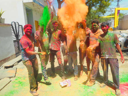 Beawar, Rajasthan, India, March 24, 2016: Indian boys celebrate Holi, the Hindu spring festival of colors, in Beawar. Photo: Sumit Saraswatのeditorial素材