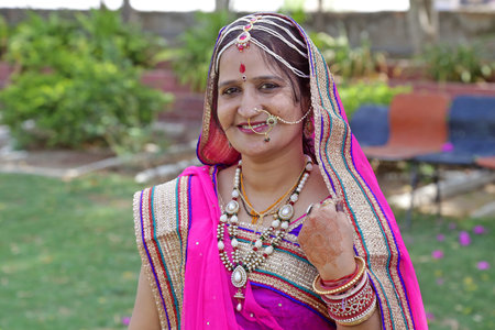 Beawar, Rajasthan, India, April 9, 2016: Portrait of a smiling rajasthani young woman in traditional...