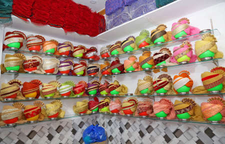 Various types of colorful turbans on display for sale during wedding season in Beawar, Rajasthan, India. Photo: Sumit Saraswatのeditorial素材