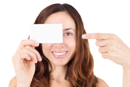 Woman presenting a blank white business card