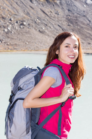 Woman trekking in nature in autumn