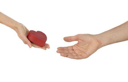 Woman giving heart to man, valentines day and love conceptの写真素材