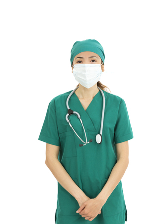 Woman surgeon wearing surgical maskの写真素材