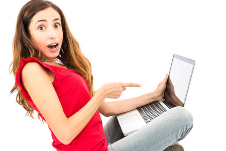 Woman showing laptopの写真素材