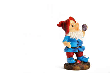 dwarf holding a grapeの写真素材