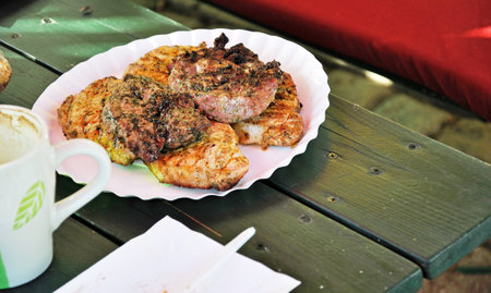 grilled pork on a plate on the table