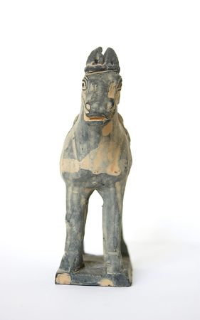 Front view of a standing terracotta horse against a white backgroundのeditorial素材