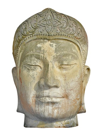 Close up of the face of an ancient weather worn stone head artifactの写真素材