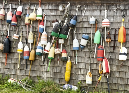 Lobster buoys and fishing shack on John Hancock Wharf - York Harbor, Maineのeditorial素材