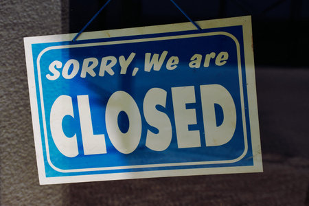 Sign with the English words: sorry, we are closed
