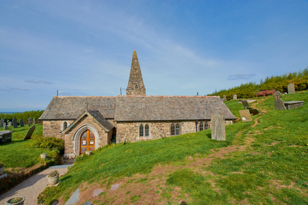 The 12th century St Enodoc Church Trebetherick, is the resting place of Poet Laureate Sir John Betjeman. Cornwall Englandの写真素材