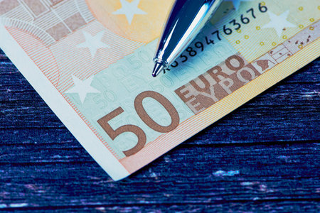 cut out of a fifty Euro banknote with part of a ballpoint pen