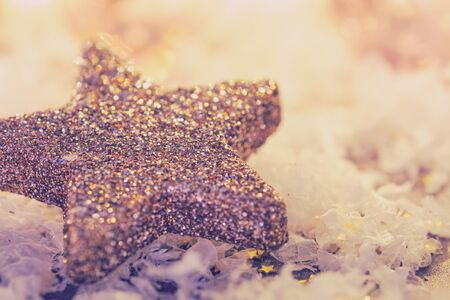 glittery star with bright and shiny lights in the background, soft lookの写真素材