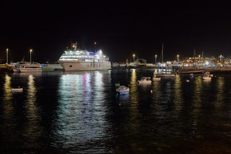 Playa Blanca, Lanzarote, Spain: December 24, 2019: Canary Islands ferry Armas in the harbor of Playa Blanca in the night. It sails between Playa Blanca Lanzarote and Corralejo Fuerteventura.のeditorial素材