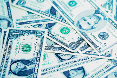 background photo with one and five dollar banknotesの写真素材