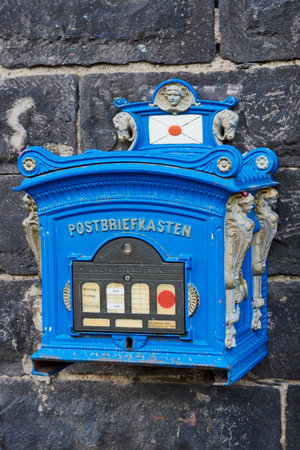 Andernach, Germany - September 26, 2018: historical mailbox in blue color from the old Prussia which is still in use for letter delivery todayのeditorial素材