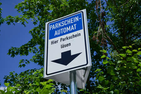 German sign, the words are meaning in English: parking ticket machine, buy parking ticket hereの写真素材