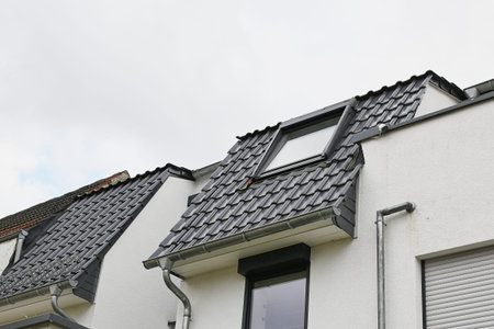 modern roof with skylight on newly built residential house