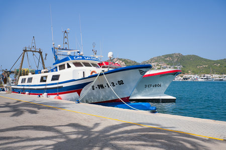 Alcudia, Mallorca, Spain - August, 08, 2021: Fishing boats in the harbor of Alcudia, Mallorcaのeditorial素材