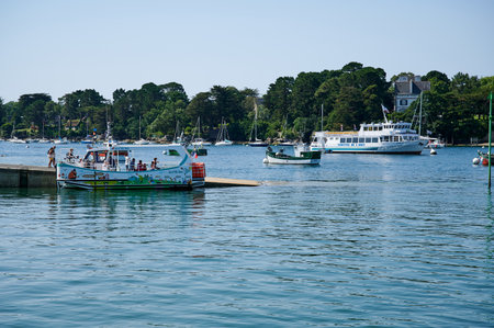 Benodet, Brittany, France - July 20,2021: ferries with tourists in the harbor of Benodet, Brittany, Franceのeditorial素材