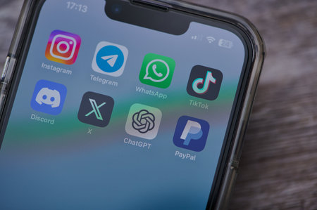 Mainz, Germany - August 02, 2023: icons of different apps like instagram, telegram, tiktok, twitter, discord on a German smartphoneのeditorial素材