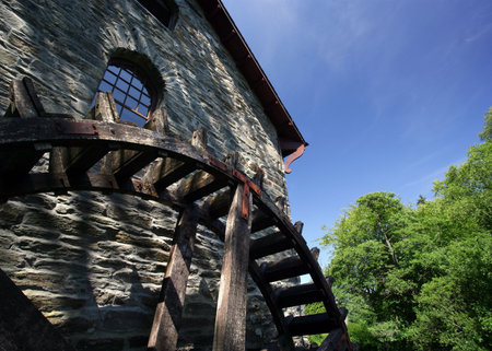 An old mill with water wheel in Scotland.の写真素材