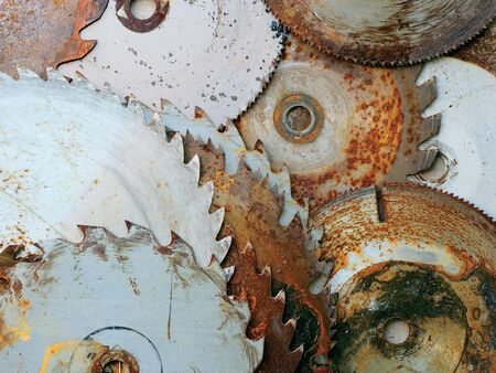 A pile of rusty circular sawblades.の写真素材