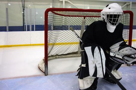 Goalie waiting for the action to come their way.の写真素材